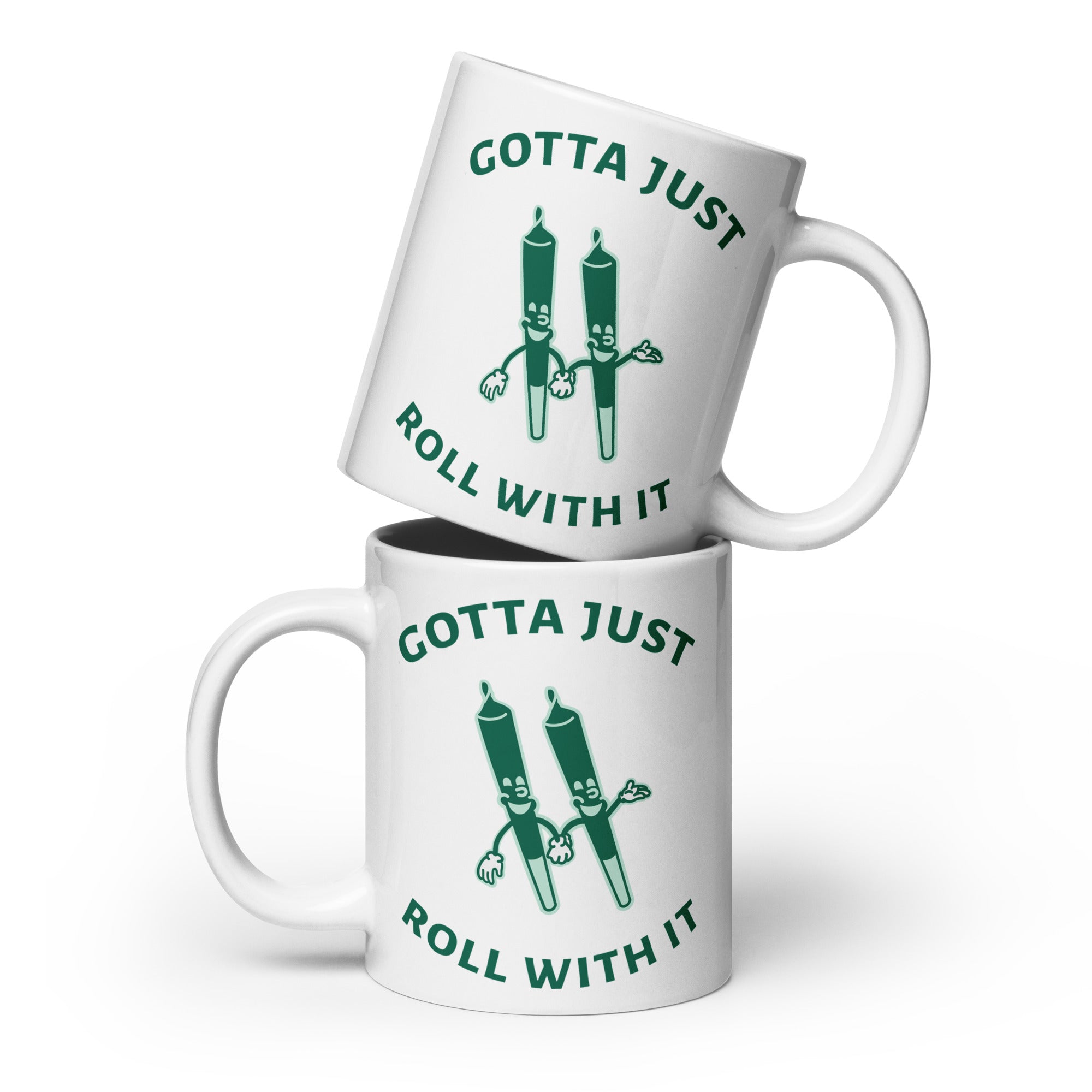 White coffee mug with an illustration of two rolled marijuana joints holding hands with the caption "Gotta Just Roll With It".