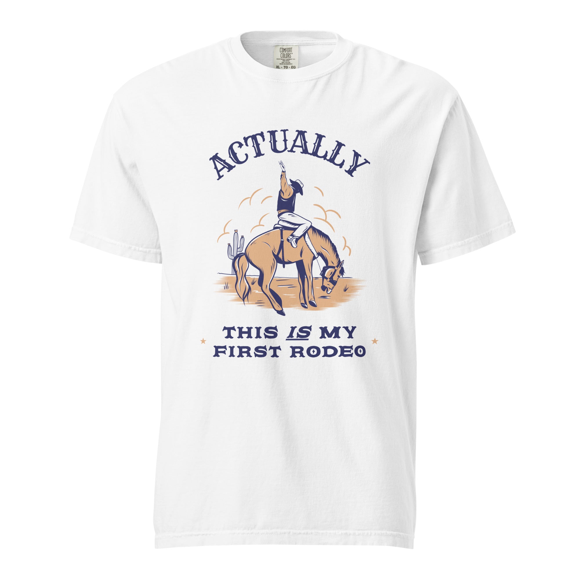 White t-shirt with an illustration of a cowboy riding a bucking horse with the caption "Actually, this IS my first rodeo".